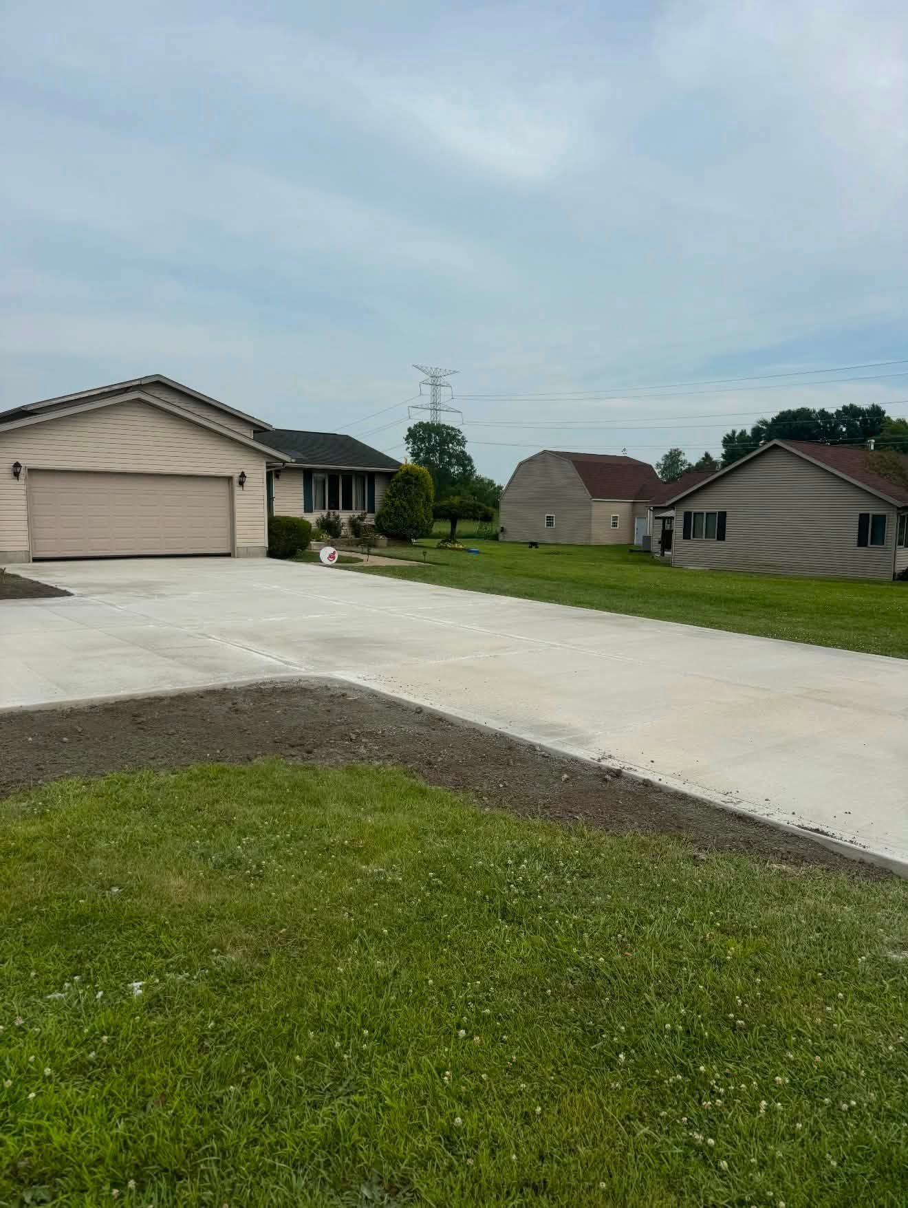 Completed large residential concrete driveway